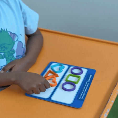 Play-based communication training is a child-centered therapeutic approach that uses structured play activities to encourage language development, social interaction, turn-taking, joint attention, and expressive skills in a natural and engaging way, helping children communicate more confidently in everyday environments.